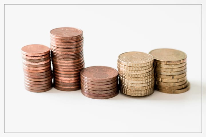 Coins stacked in a row